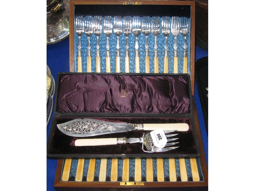 Appraisal: Lot comprising cased fish cutlery set and a cased pair