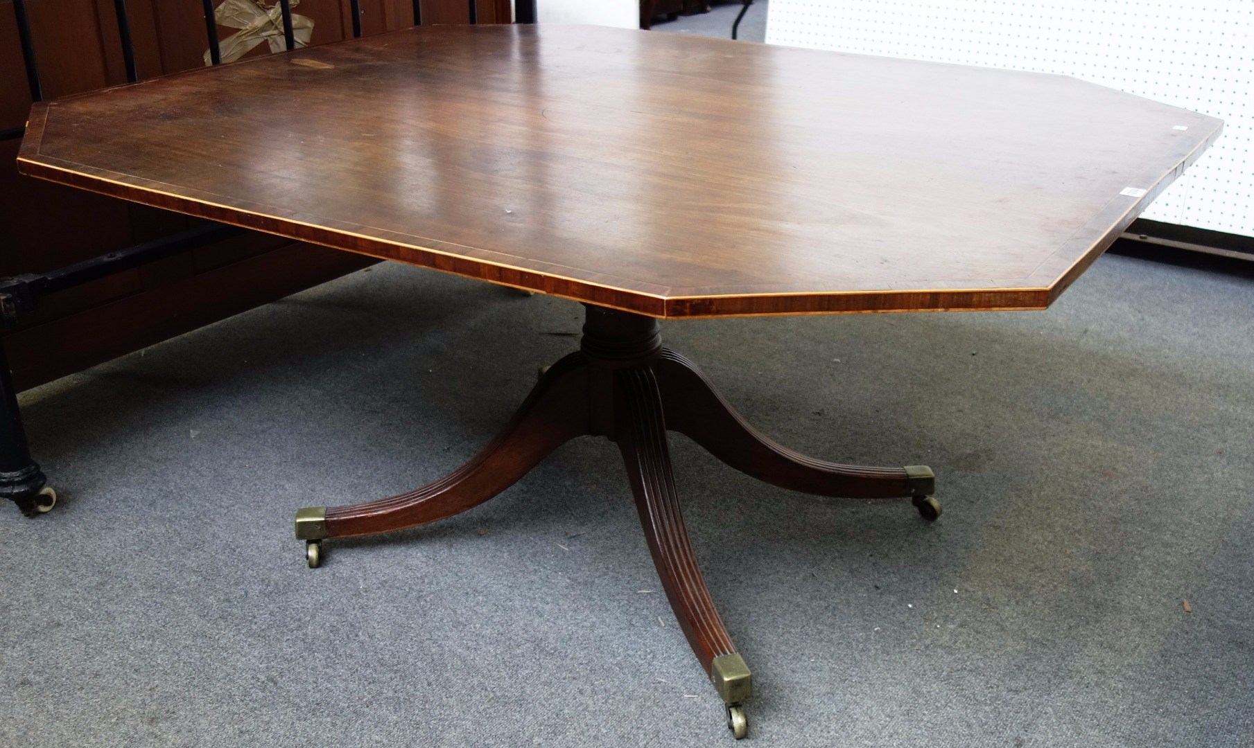 Appraisal: A late George III rosewood banded mahogany breakfast table with