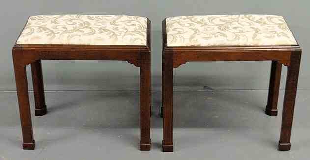 Appraisal: Pair of Baker Furniture Co Chippendale style mahogany footstools h