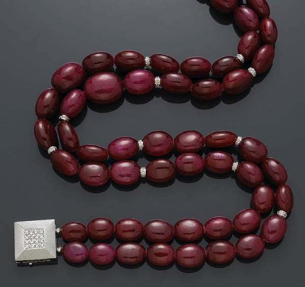 Appraisal: A ruby and diamond double strand graduated necklace estimated total