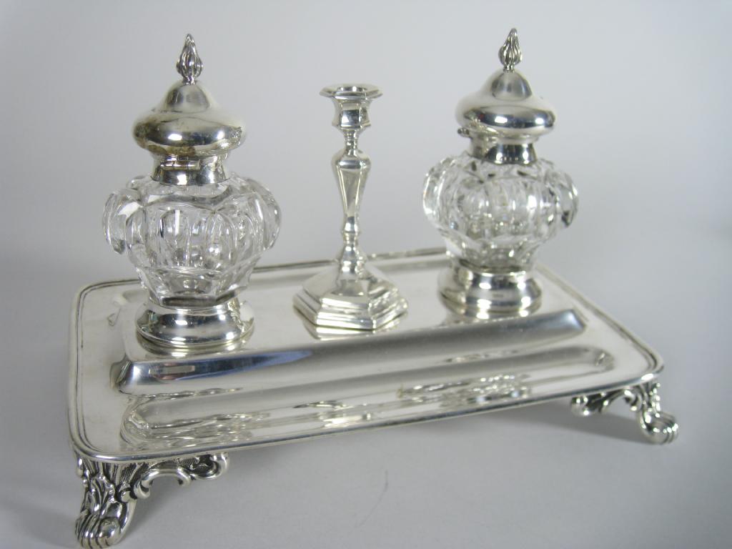 Appraisal: A Victorian rectangular Inkstand fitted two glass inkwells with flambe