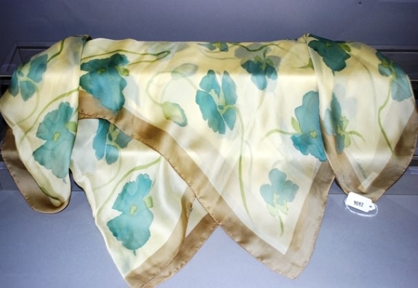 Appraisal: Calvin Klein yellow blue green sheer watercolor print silk scarf