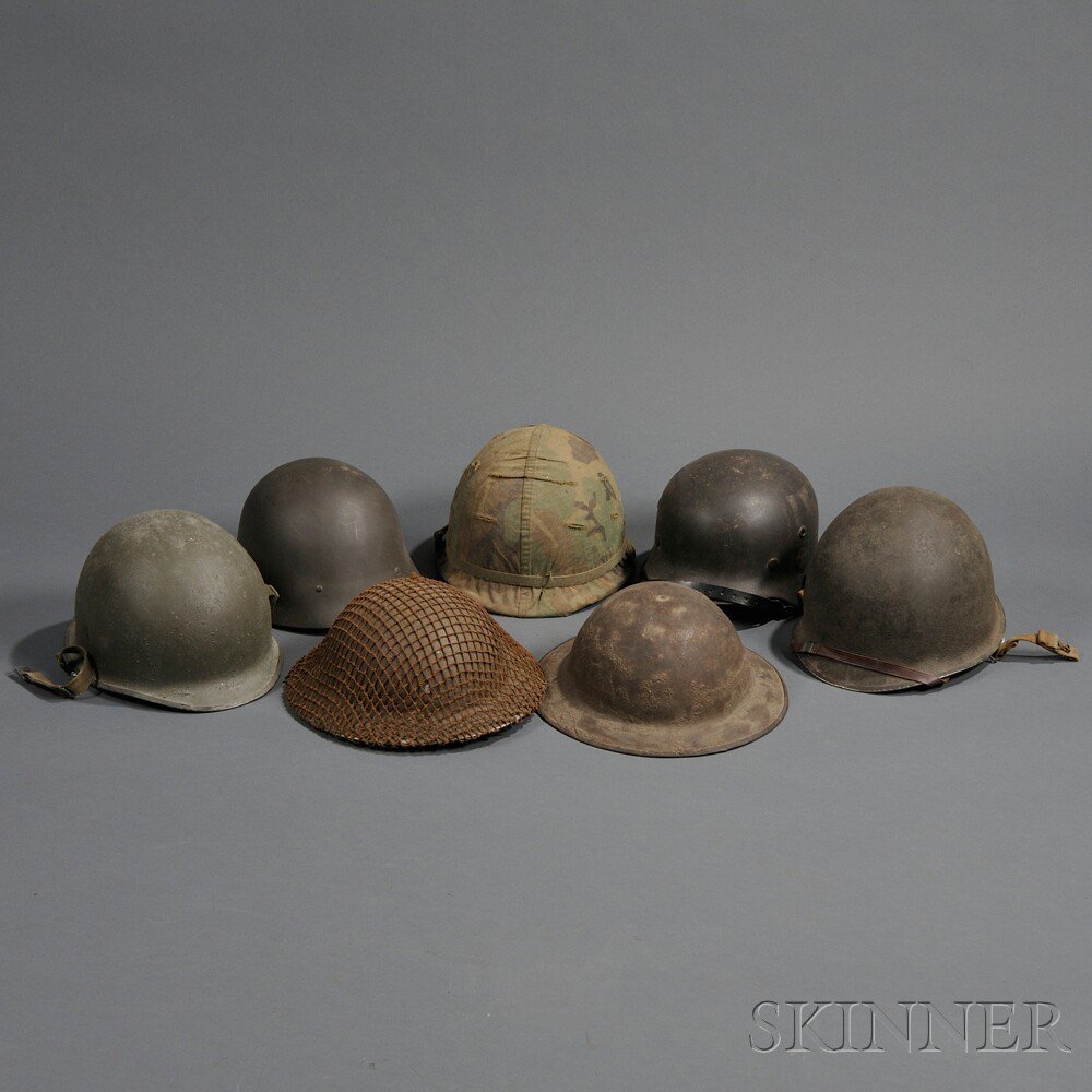 Appraisal: Seven Helmets c - s a German Model double-decal police