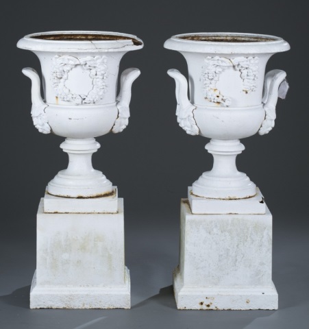 Appraisal: Pair of Painted White Cast Iron Urns Rust and crack