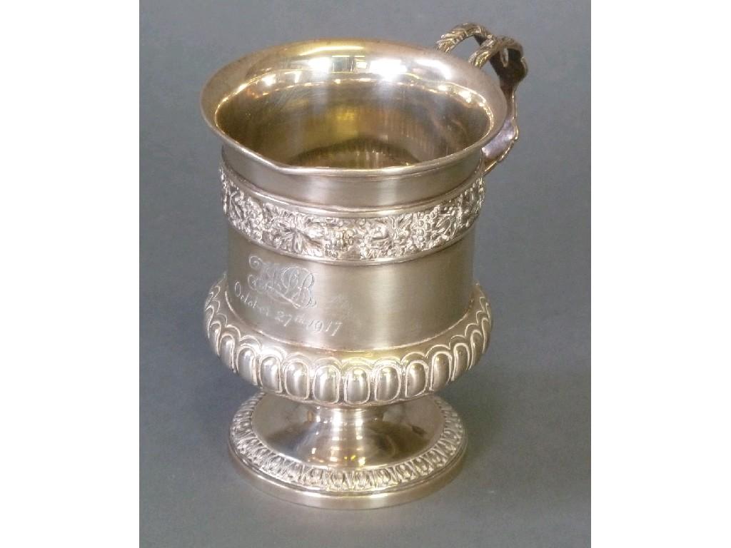 Appraisal: GEORGE V EMBOSSED SILVER PEDESTAL CHRISTENING MUG of good gauge