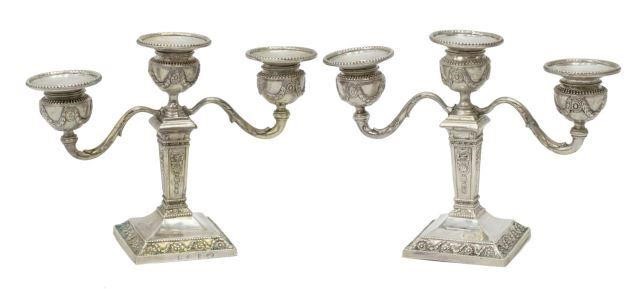 Appraisal: pair Hanau silver content unknown three-light candlesticks pseudo hallmarks attributed