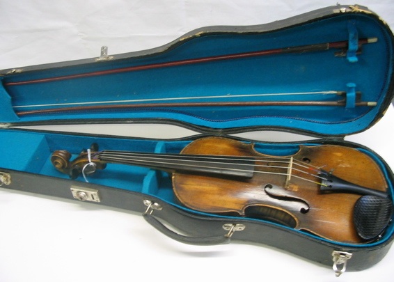 Appraisal: A FRENCH VIOLIN BOWS AND CASE The violin marked with