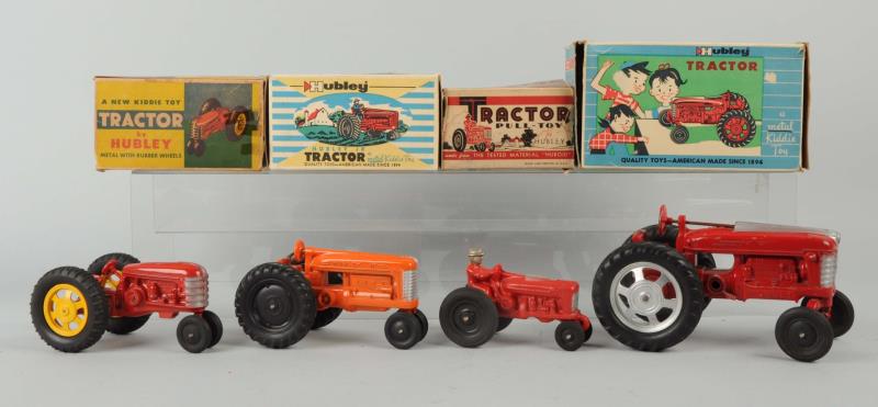 Appraisal: Lot Of Hubley Boxed Tractors All four tractors have their