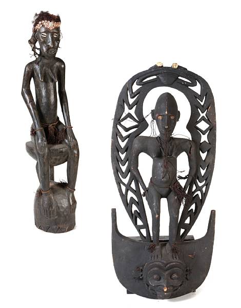 Appraisal: Two New Guinea carved female figures height of taller figure