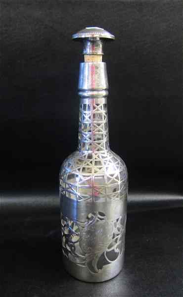 Appraisal: SILVER OVERLAY GLASS DECANTER clear glass having cork with spout