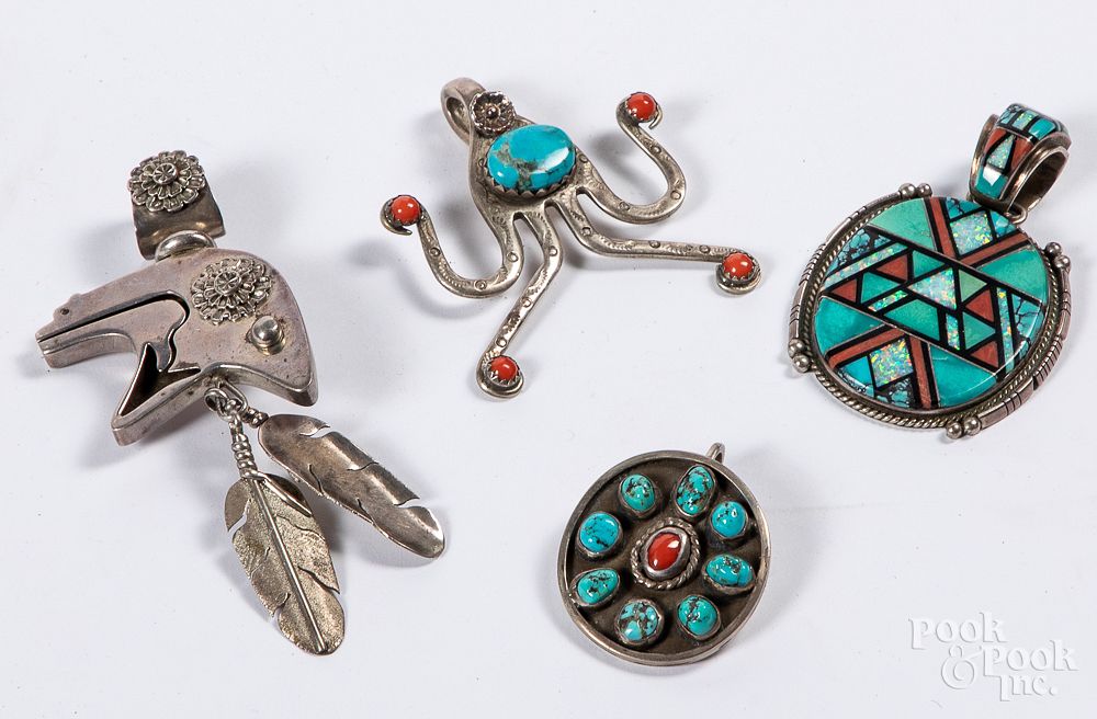 Appraisal: Four Native American Indian pendants Four Native American Indian pendants