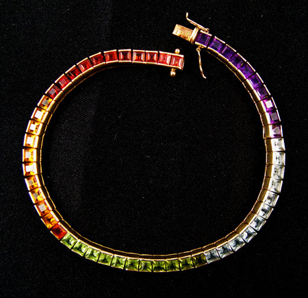 Appraisal: K MULTI-COLORED GEMSTONE BRACELET K yellow gold bracelet contains square