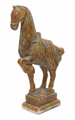 Appraisal: Tang Dynasty style plaster horse sculpture one front leg raised