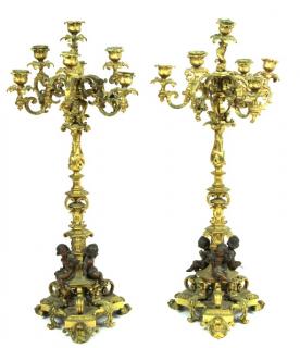 Appraisal: Very Fine Pair of Bronze Cherub Candelabras Very Fine Pair