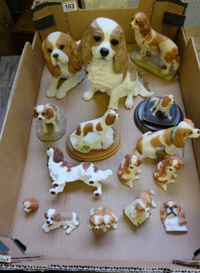 Appraisal: A collection of resin models of King Charles Spaniels including