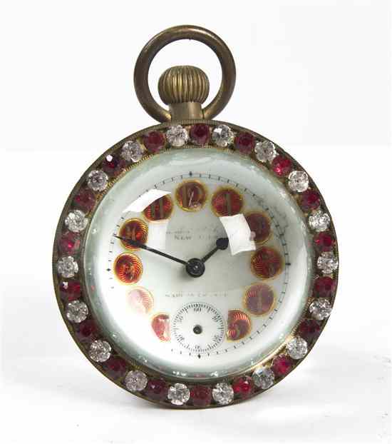 Appraisal: A French Paperweight Desk Clock the enameled dial with Arabic