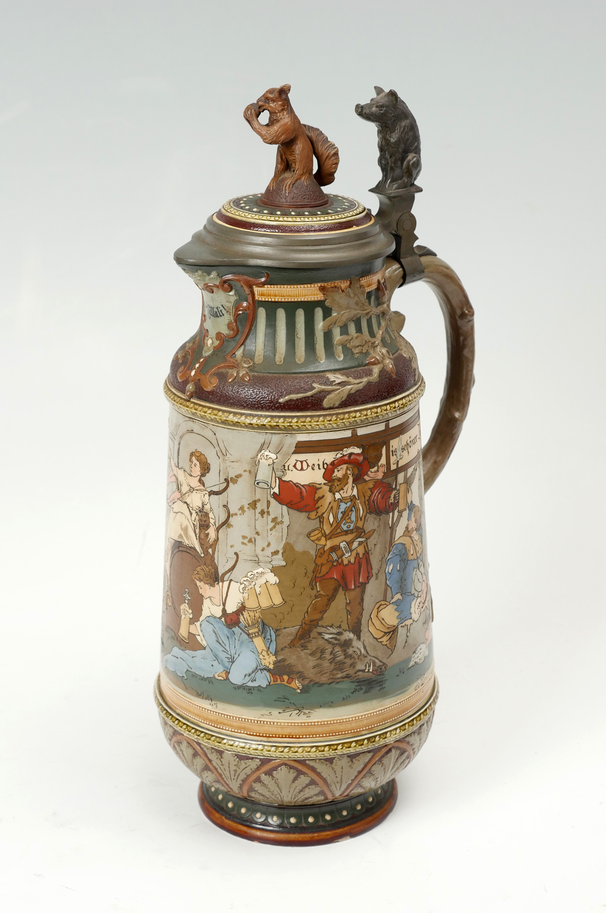 Appraisal: GERMAN FIGURAL METTLACH STEIN Large stein having a painted figural