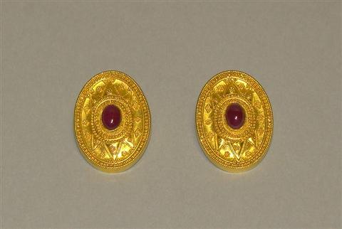 Appraisal: LALAOUNIS OVAL RUBY AND GOLD EAR CLIPS Signed with Ilias