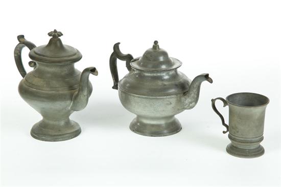 Appraisal: THREE PIECES OF PEWTER Nineteenth century Two marked American teapots