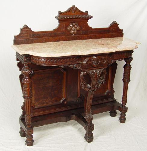 Appraisal: FINELY CARVED WALNUT HIGH VICTORIAN FOYER TABLE Shaped and beveled