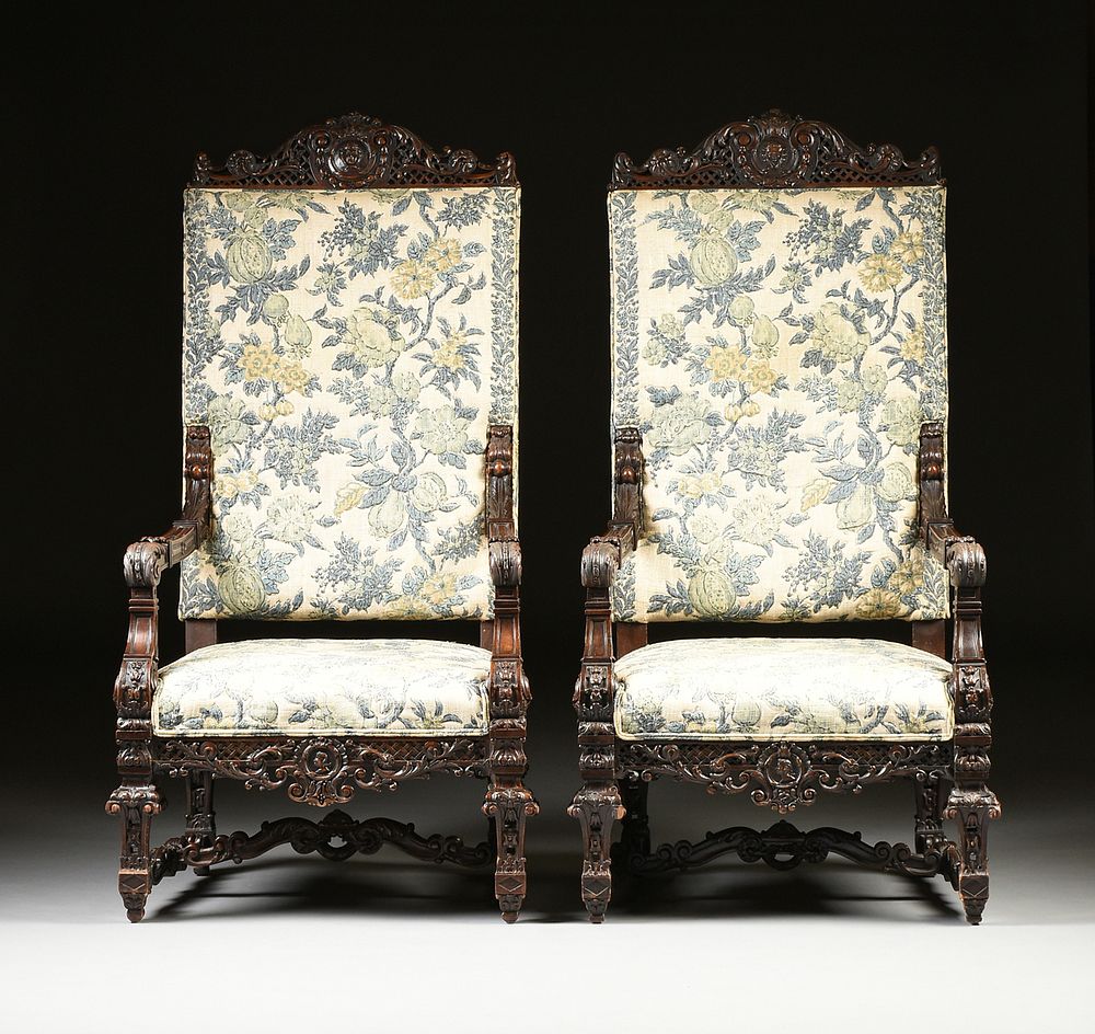 Appraisal: A PAIR OF ITALIAN BAROQUE REVIVAL UPHOLSTERED AND CARVED WALNUT