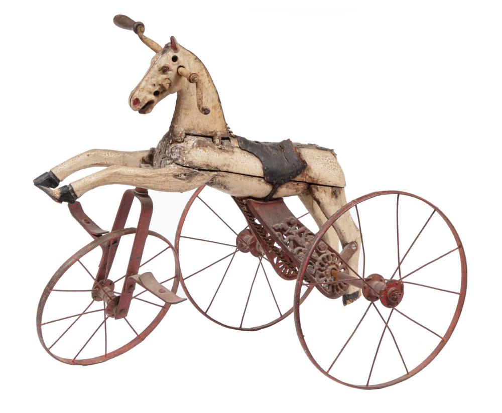 Appraisal: CARVED WOOD AND IRON HORSE TRICYCLEAntique Carved Wood and Iron