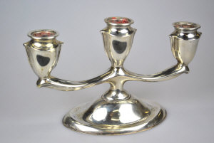 Appraisal: A German standard three-sconce candelabrum on weighted oval base