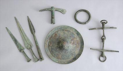 Appraisal: GROUP OF SEVEN ANCIENT BRONZE ARTICLES Comprising a rondel with