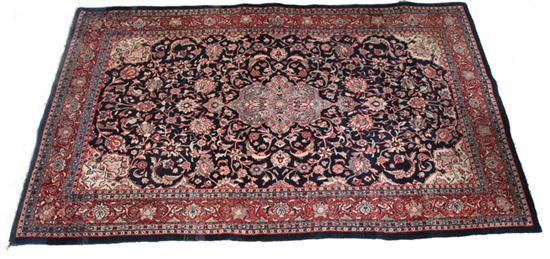 Appraisal: ORIENTAL RUG Indo-Persian floral with salmon border and midnight blue