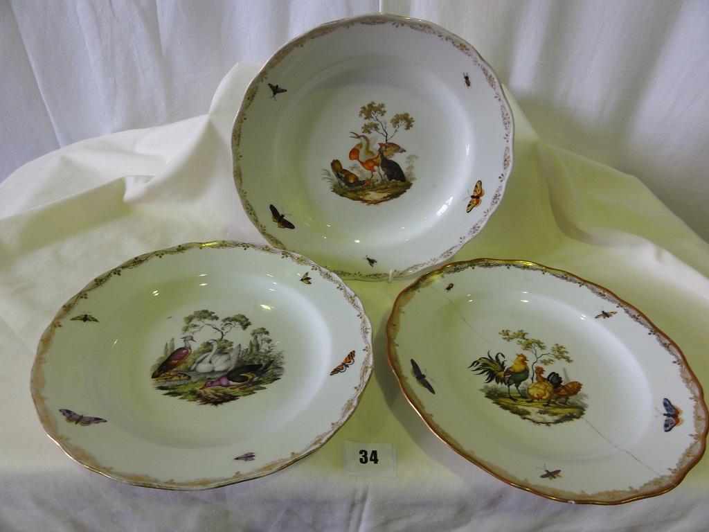 Appraisal: A set of three th century continental dessert plates with