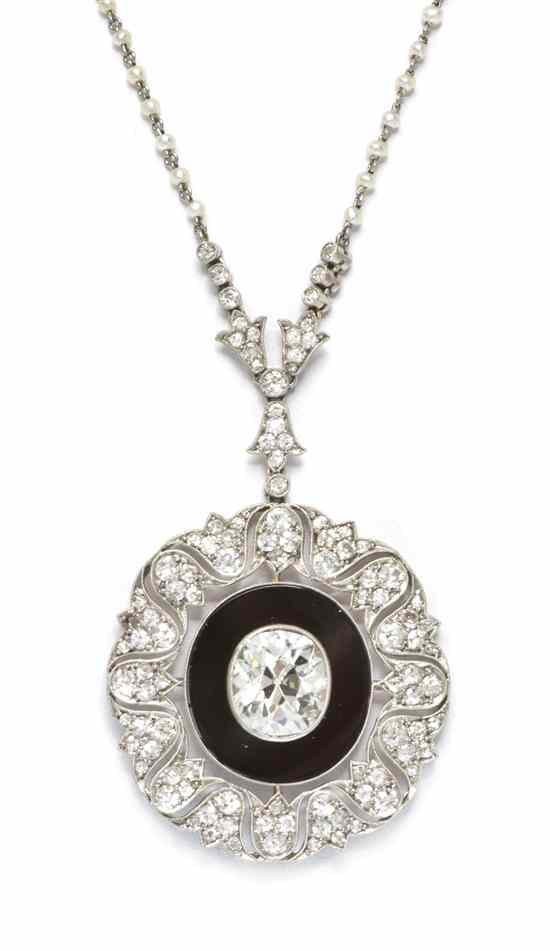 Appraisal: An Art Deco Platinum Diamond Seed Pearl and Onyx Pendant