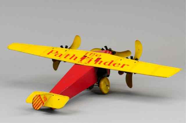 Appraisal: KATZ TOYS ''PATHFINDER'' TRI-MOTOR Lithographed tin done in red fuselage