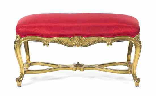 Appraisal: A Louis XV Style Giltwood Bench having an upholstered seat