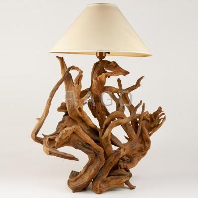 Appraisal: AMERICAN STUDIO Free-form driftwood table lamp with parchment shade USA