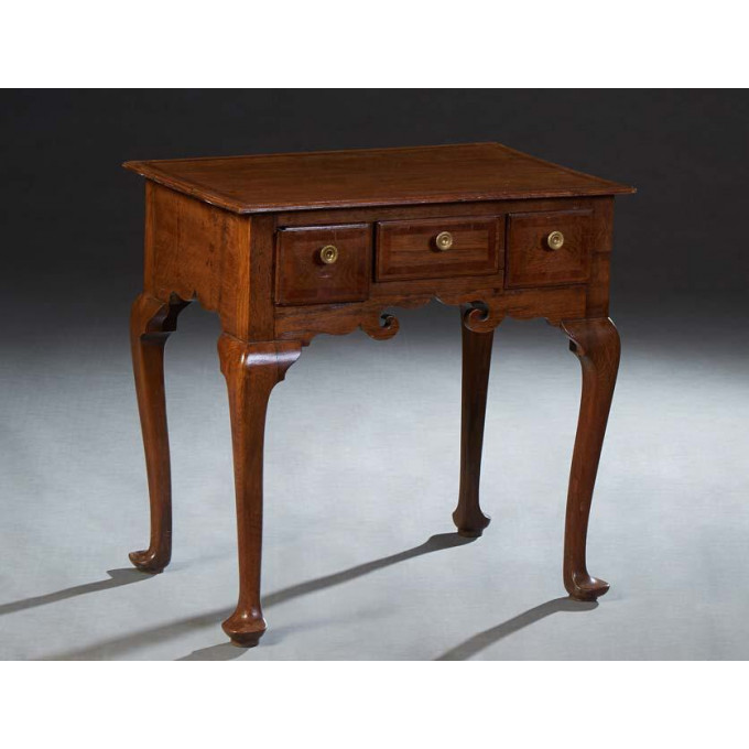 Appraisal: English Inlaid Carved Oak Lowboy th c the shaped rounded