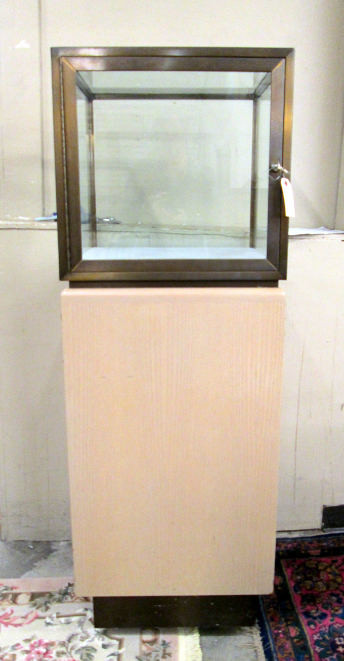 Appraisal: MODERN GLASS AND BRASS DISPLAY CASE ON PEDESTAL the cube-form