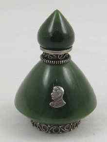 Appraisal: A nephrite scent bottle with silver mounts and applied Soviet