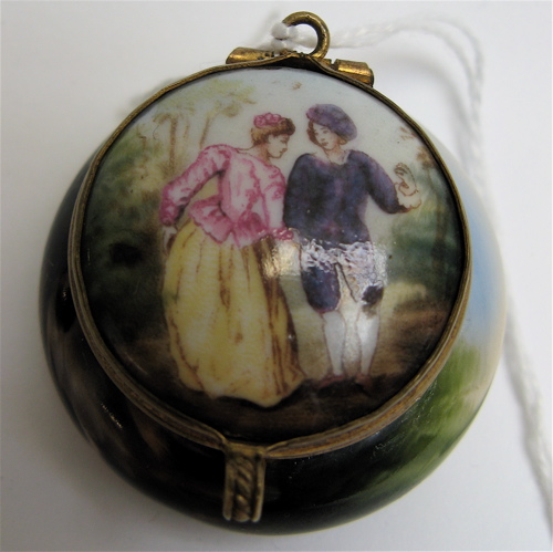 Appraisal: A FRENCH ENAMELED MINIATURE ROUGE BOX hand painted courting couple