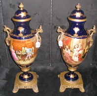 Appraisal: PAIR TH CENTURY PORCELAIN SEVRES COVERED URNS Cobalt blue with