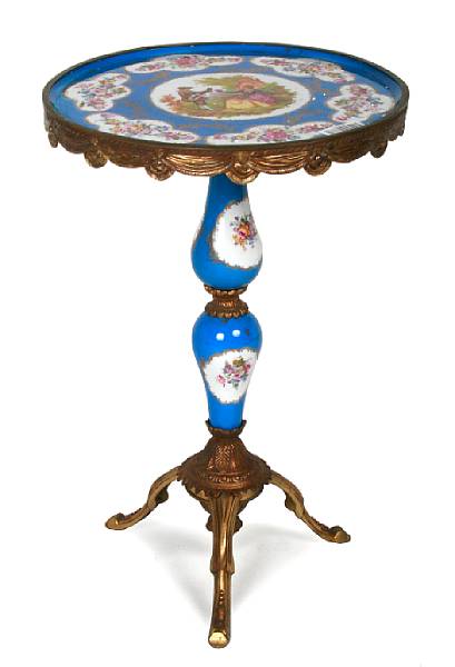 Appraisal: A small Sevres style porcelain table with bronze mount height