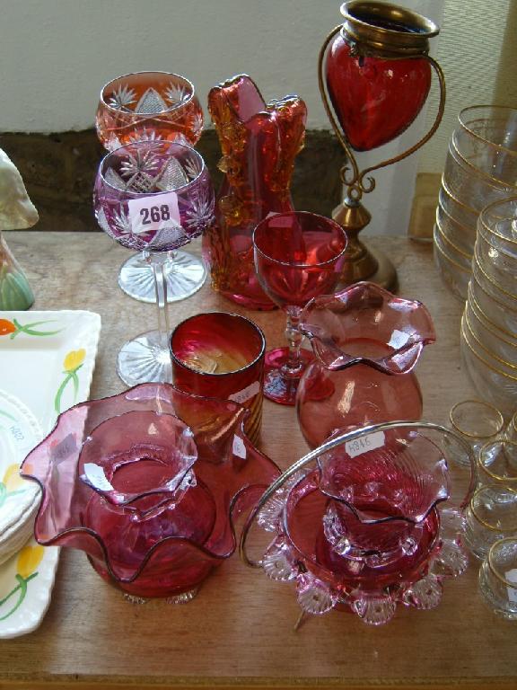 Appraisal: A collection of cranberry glassware including a bowl with crimped