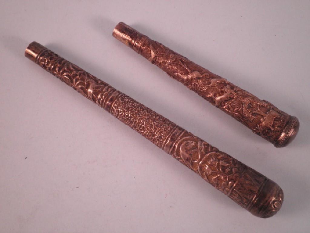 Appraisal: Two late th-early thC white metal parasol handles each decorated