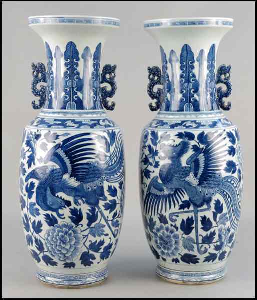 Appraisal: PAIR OF CHINESE BLUE AND WHITE PORCELAIN URNS Height ''