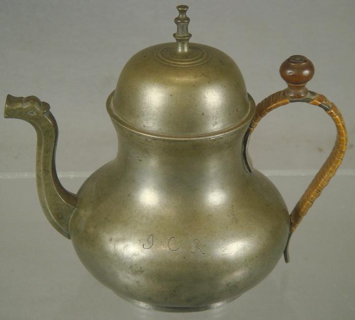 Appraisal: Pear shaped Continental pewter teapot bird head spout wood finial