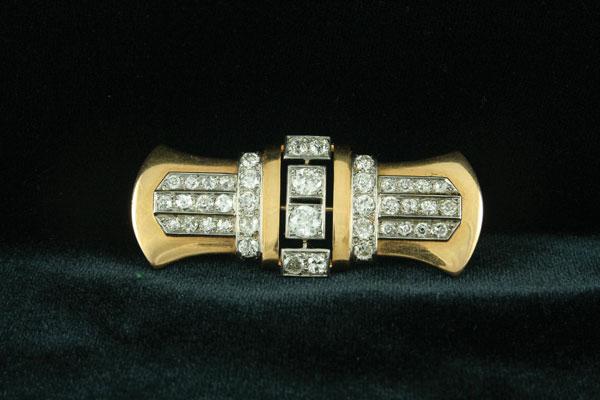 Appraisal: An Art Deco Diamond Brooch the stylised bow shaped plaque