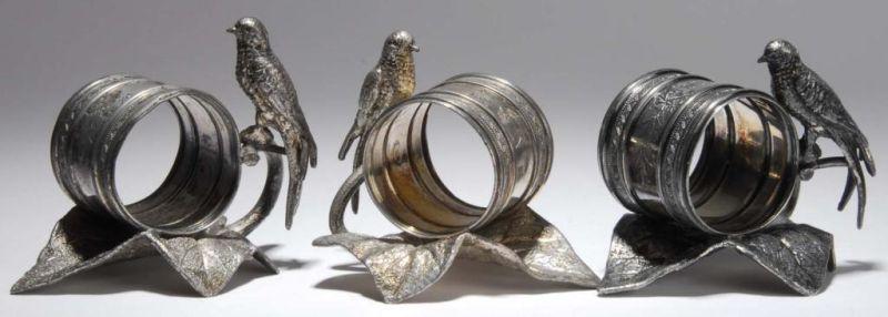 Appraisal: Lot of Bird on Large Leaf Figural Napkin Rings Description