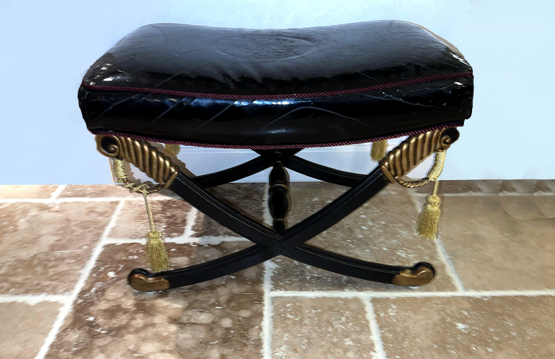 Appraisal: CROSS SWORD PERIOD STYLE BLACK PATENT LEATHER OTTOMAN With black