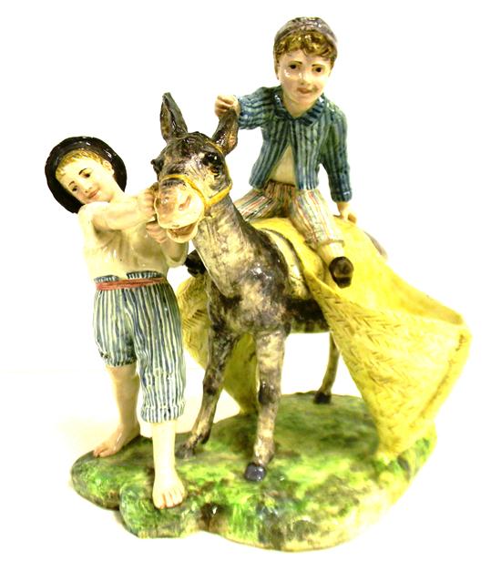 Appraisal: Staffordshire soft-paste porcelain figure of two boys and donkey one