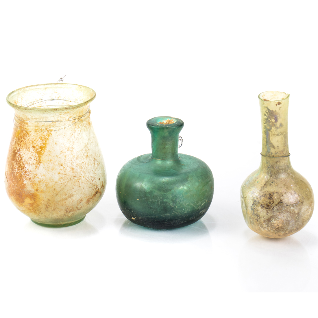 Appraisal: LOT OF ROMAN GLASS VESSELS INCLUDING A GREEN BALL FLASK