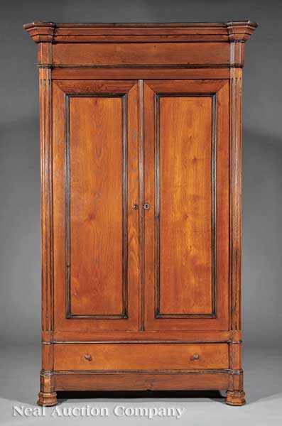 Appraisal: A French Carved Oak Armoire th c molded cornice pair